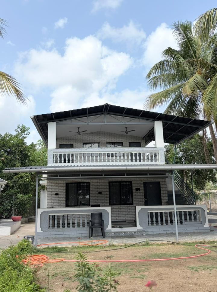 Malhar Baug Resort garden and rooms in Nagaon, Alibaug